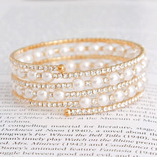 Load image into Gallery viewer, 5 Row Gold Pearl Memory Bracelet

