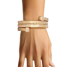 Load image into Gallery viewer, Bangle Gold Coiled Tubogas Style Spring Bracelet
